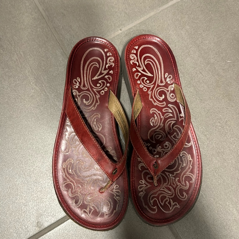 Red olukai women’s flip flops